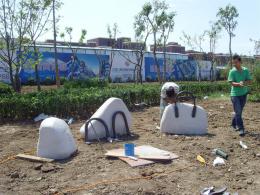 hj1736 石雕—箱包_青島國際服裝城不銹鋼雕塑、石雕、玻璃鋼雕塑_濱州宏景雕塑有限公司